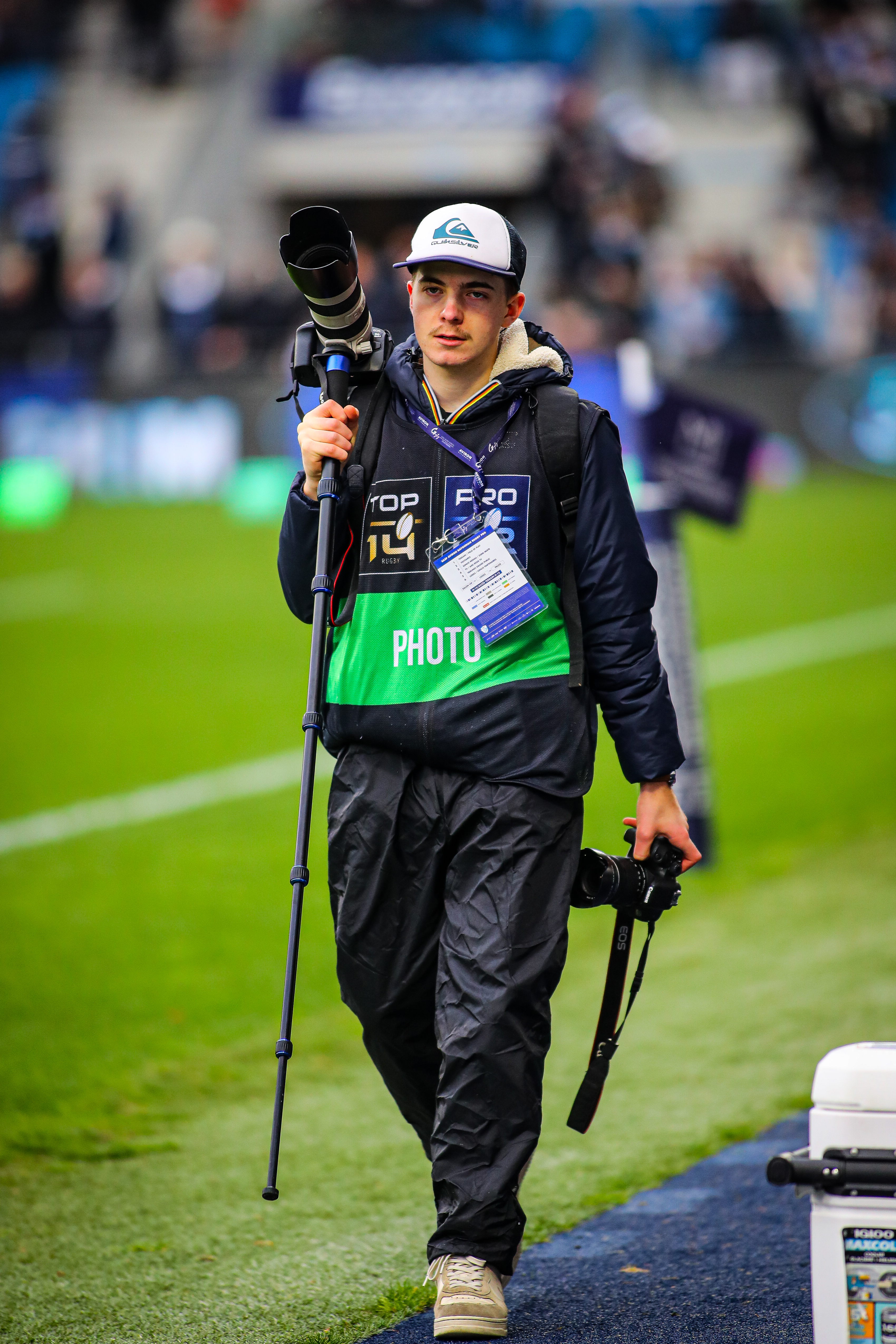 Photographe sportif sur le terrain