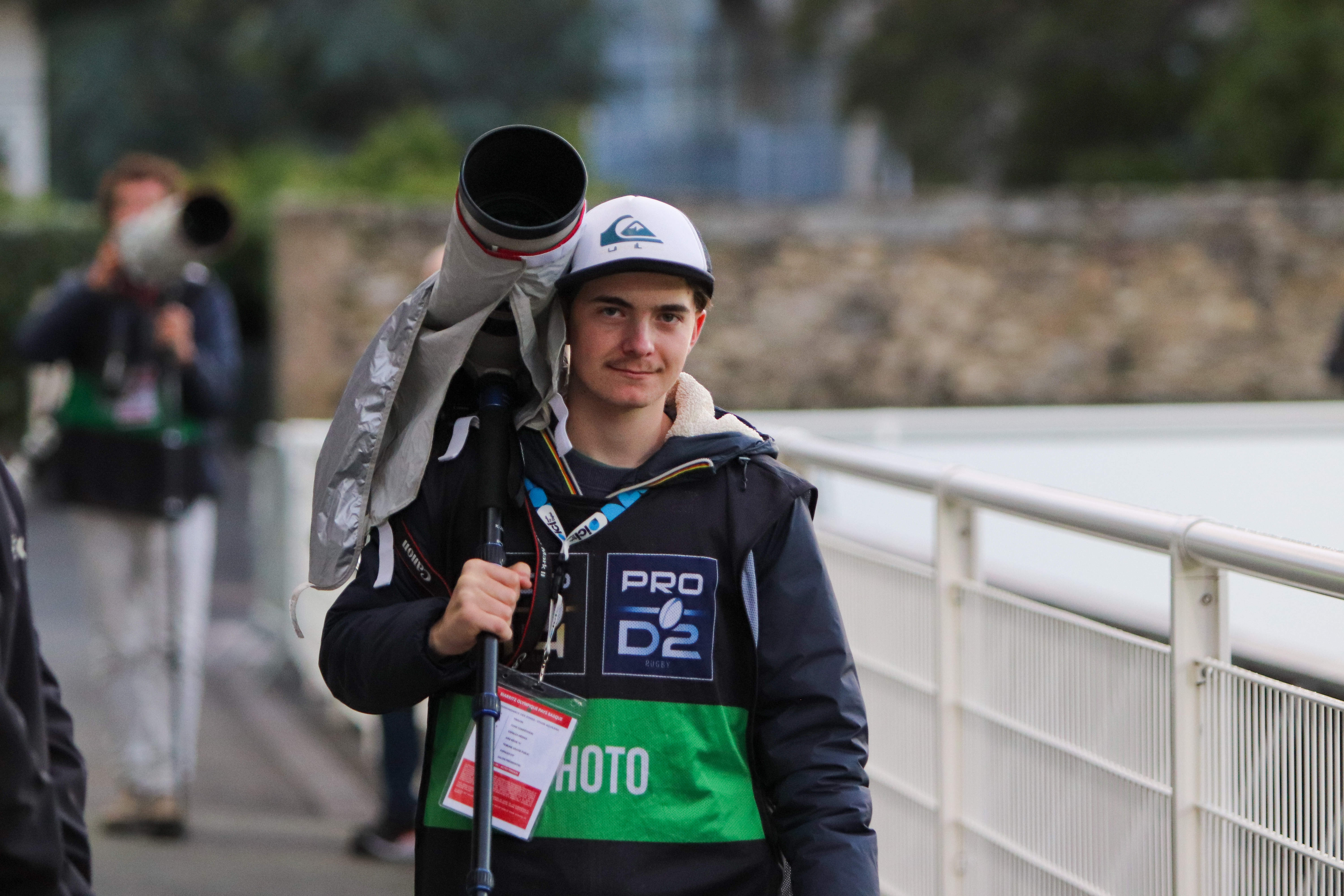 Photographe en action sur un stade